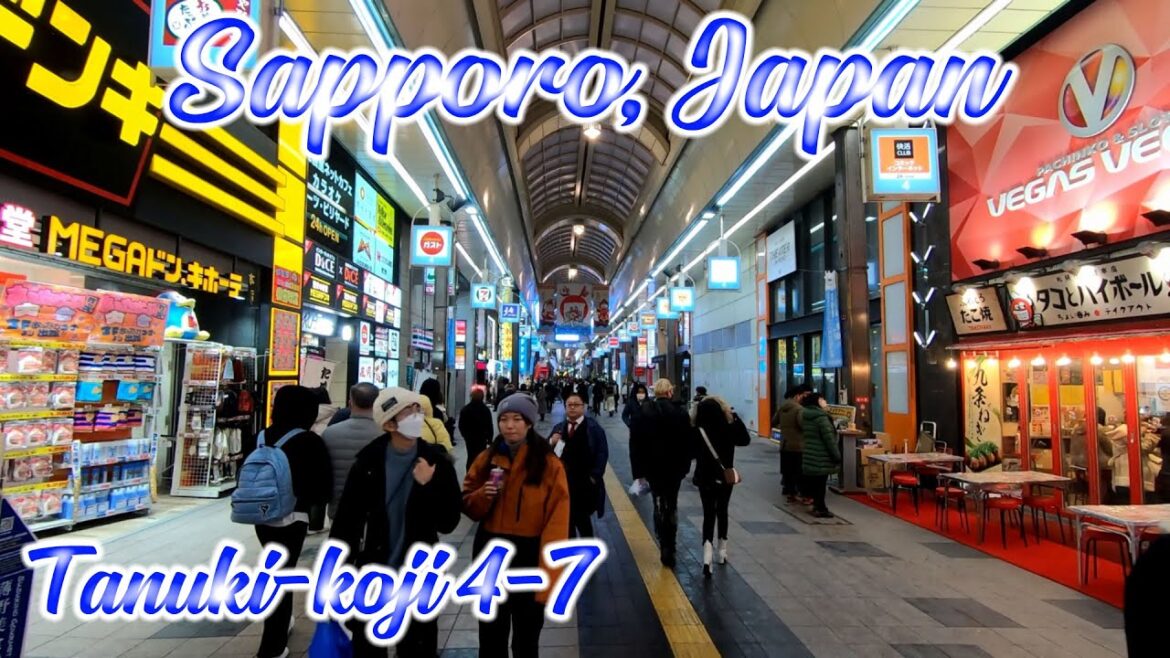 Walking in Hokkaido, Japan. Walk at Tanuki-koji 4-7 at Night in Winter. ORANGE ua