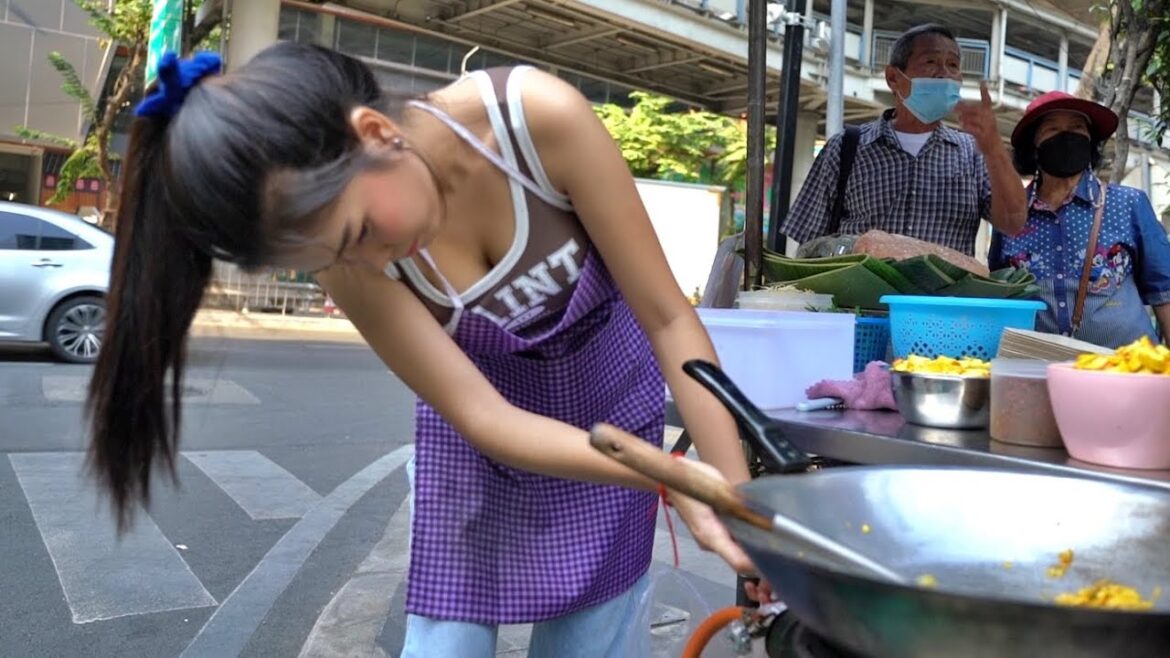 The most Famous and Pretty pad thai girl in bangkok, thailand street food.