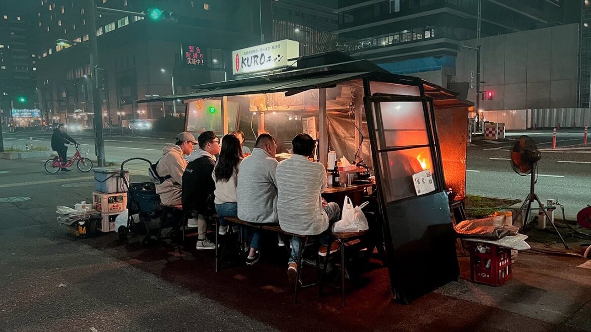 Serving Charcoaled Chicken at one of Fukuoka’s Best Yatai Serving Charcoaled Chicken at one of Fukuoka's Best Yatai