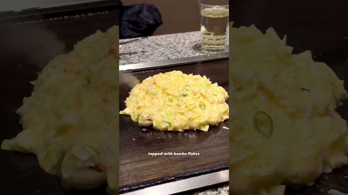 Trying the FAMOUS Okonomiyaki in Osaka Japan #shorts #japan #okonomiyaki