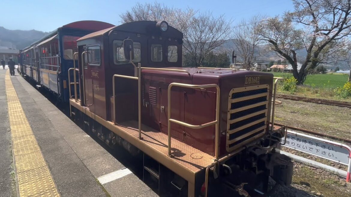 A trolley train running through a large hole that erupted 90,000 years ago. The world's largest Aso