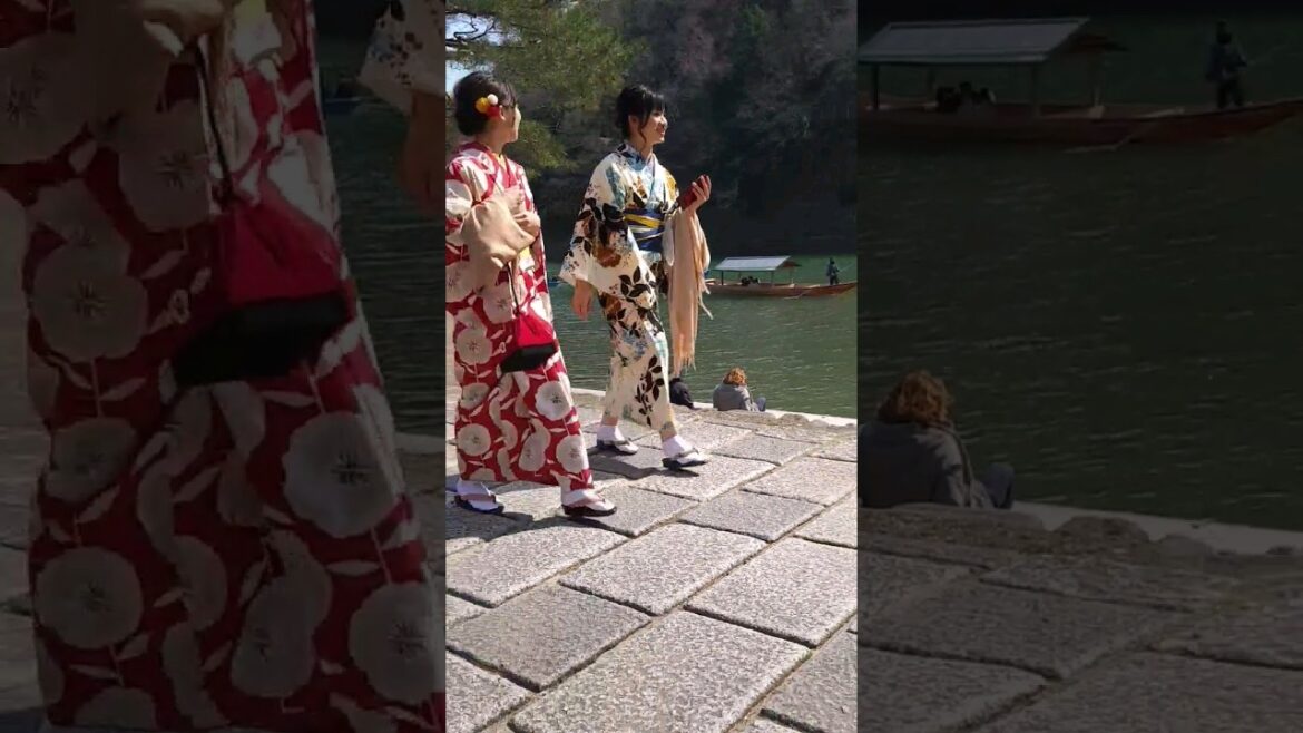 Peaceful stroll along the banks of the Oigawa River, Arashiyama, Kyoto Japan