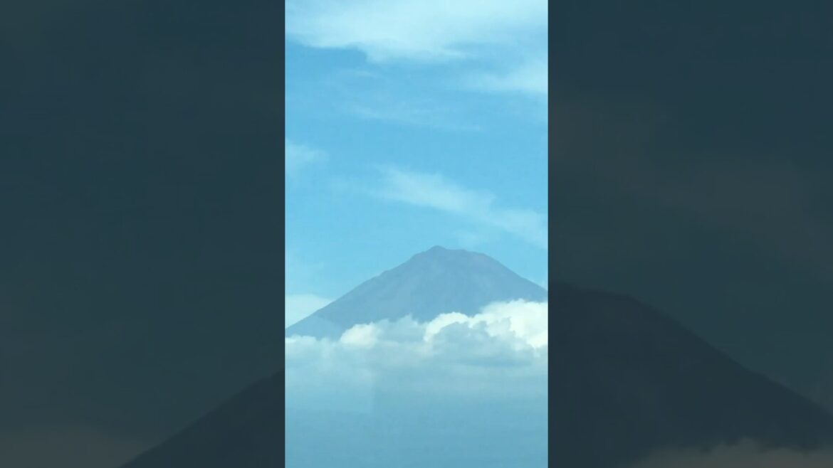 Glimpse Of Mt Fuji From The Bullet Train | Japan 🏔️ #shorts #travel #shinkansen #volcano #iconic Glimpse Of Mt Fuji From The Bullet Train | Japan 🏔️ #shorts #travel #shinkansen #volcano #iconic