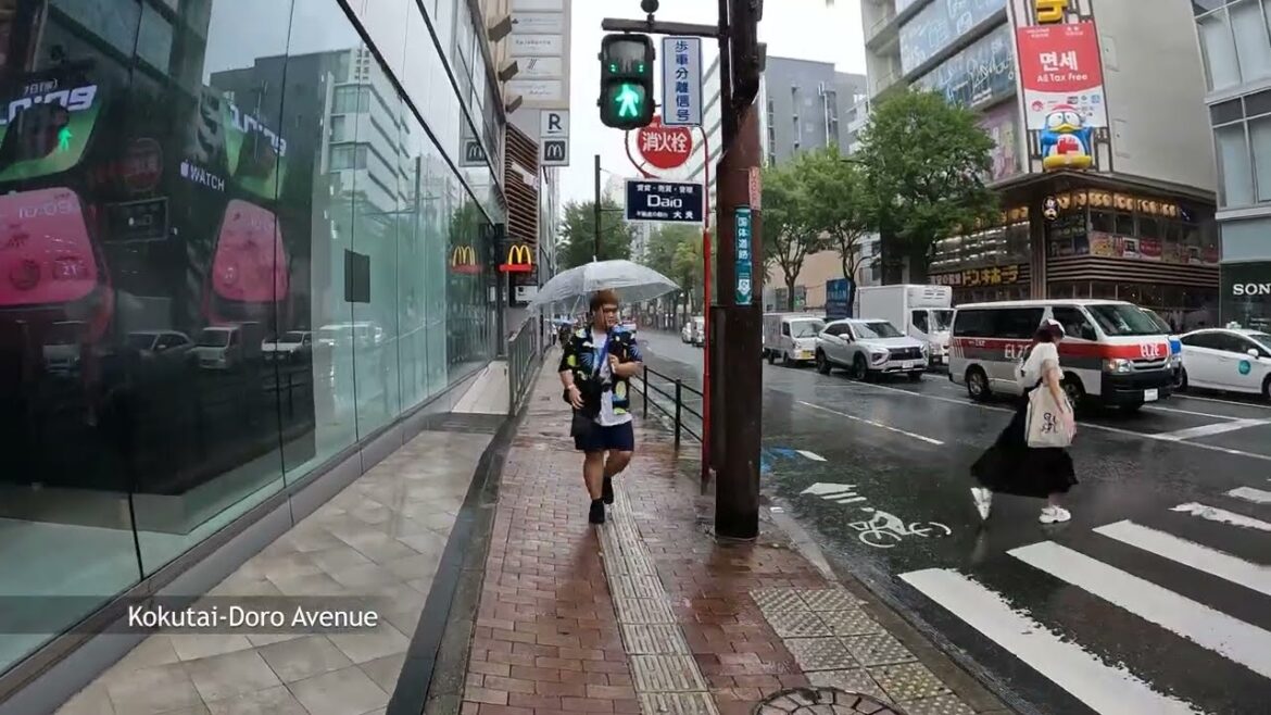 Walking in the rain in downtown ”Tenjin”, Japan