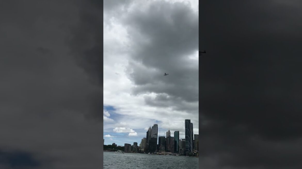 Plane Flies Over Sydney Harbour Bridge Plane Flies Over Sydney Harbour Bridge