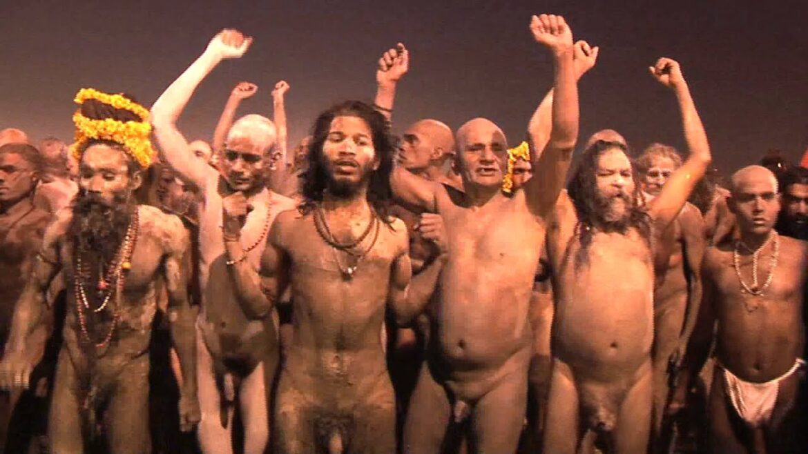 Naked sadhus posing for camera while going for holy snan Naked sadhus posing for camera while going for holy snan