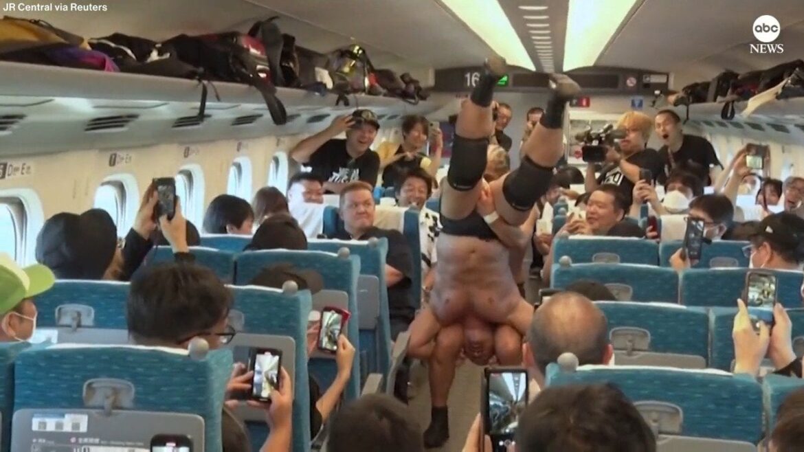 Japanese pro wrestlers have a match aboard a bullet train