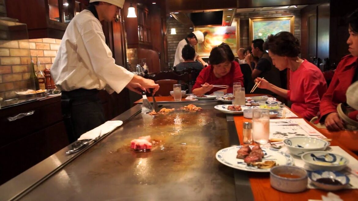 Japanese chef preparing Kobe beef steaks