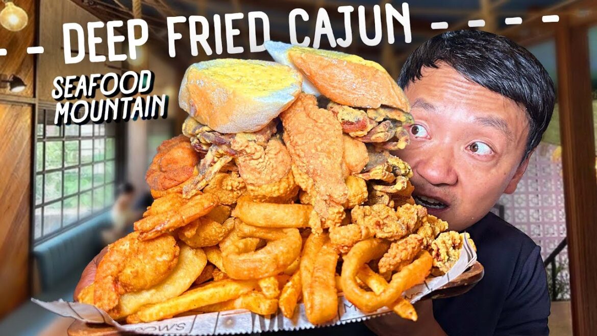 DEEP FRIED Cajun SEAFOOD MOUNTAIN & Butcher Shop Sandwich in New Orleans DEEP FRIED Cajun SEAFOOD MOUNTAIN & Butcher Shop Sandwich in New Orleans