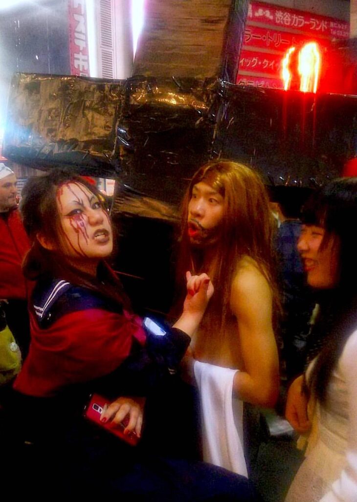 Zombie Girl vs Japanese Jesus in Shibuya on Halloween