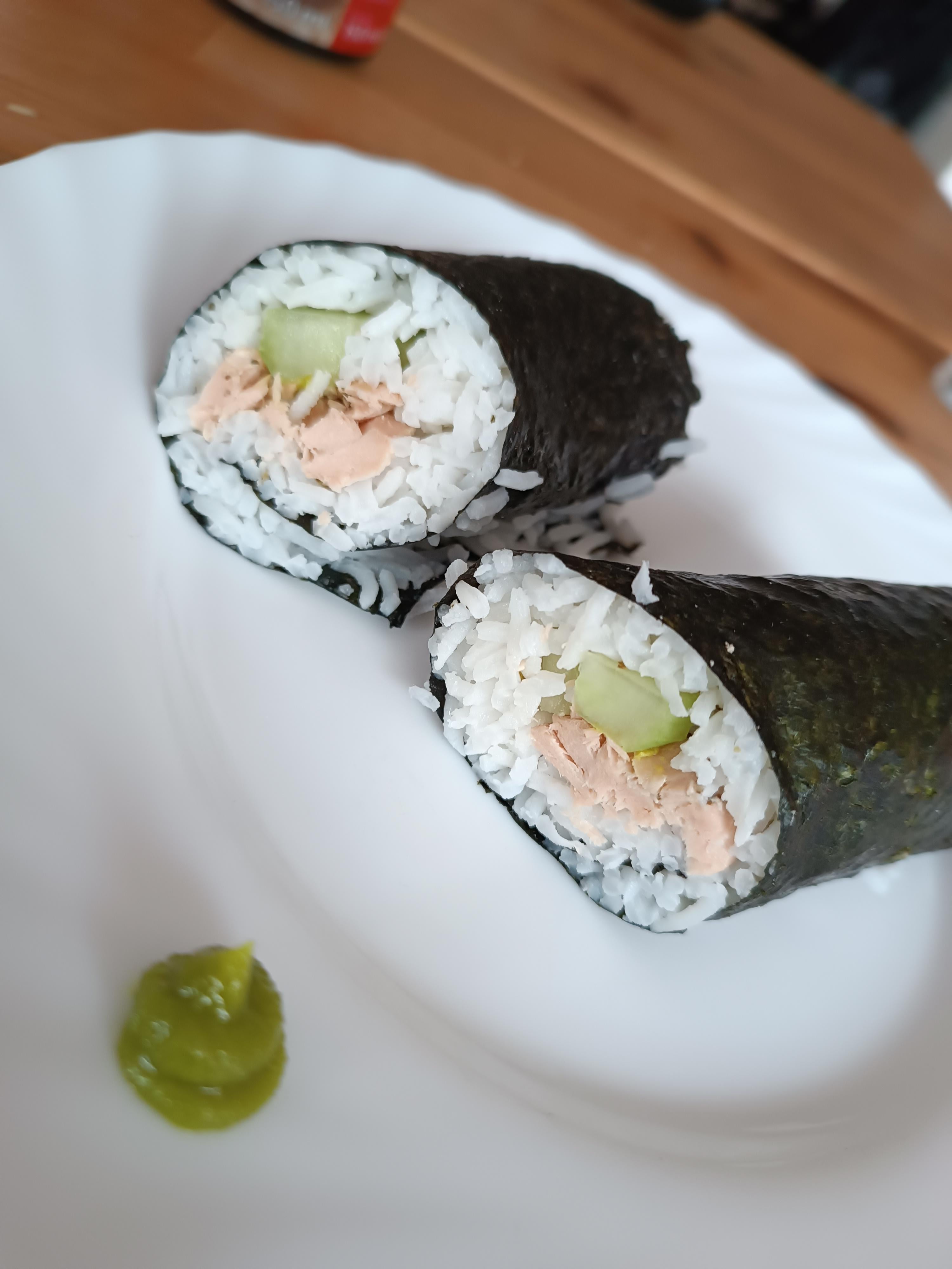 Sushi wrap from Basmati rice and cooked salmon + cucumber. (Was hungry