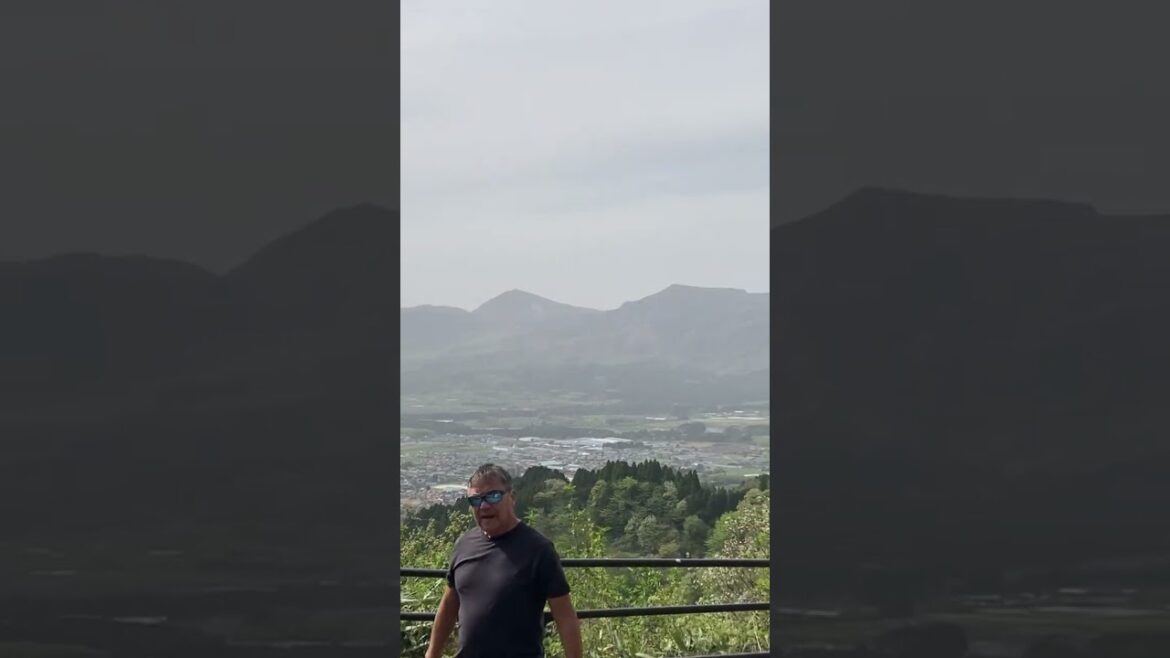 Checking one of the many lookouts on the way to Mount Aso in Kumamoto Prefecture.