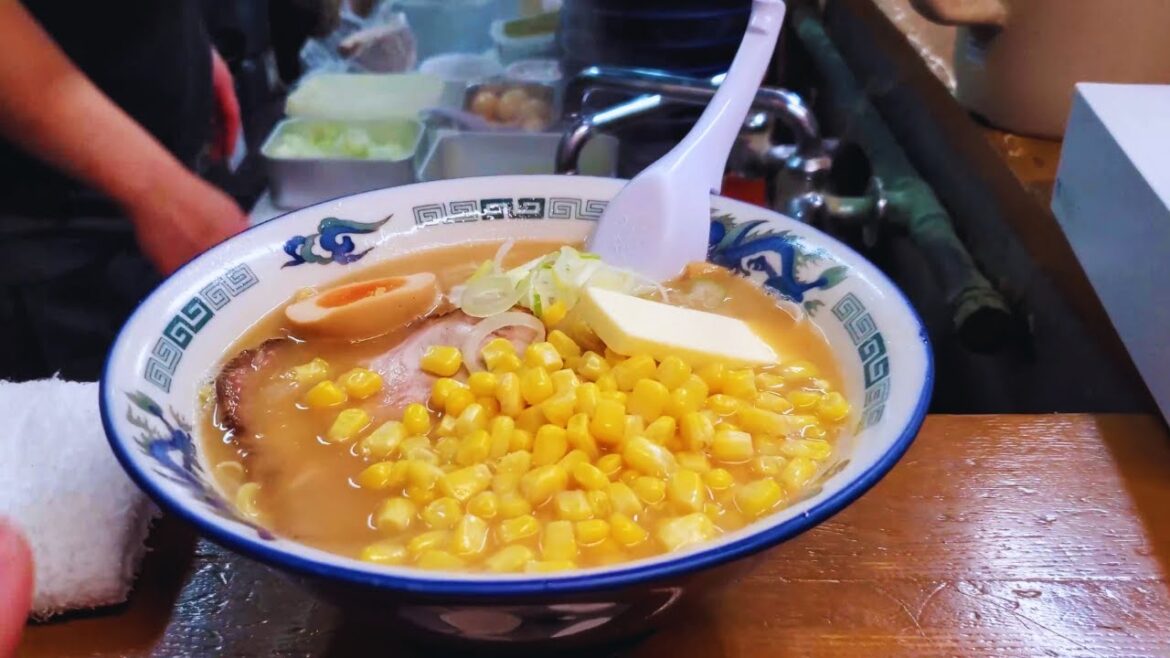 BUTTER RAMEN! Eating at the FAMOUS Ramen NOODLE ALLEY in Sapporo Japan! Foods to Eat Before You Die! BUTTER RAMEN! Eating at the FAMOUS Ramen NOODLE ALLEY in Sapporo Japan! Foods to Eat Before You Die!