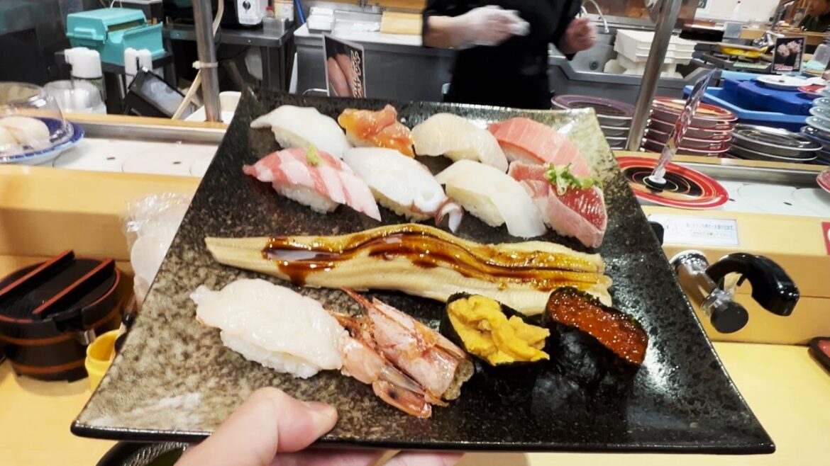 A conveyor belt sushi restaurant where the sushi lunch is a great deal A conveyor belt sushi restaurant where the sushi lunch is a great deal