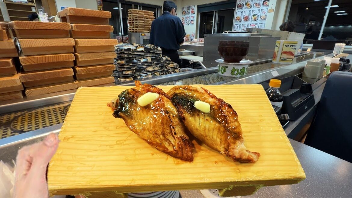 Try butter sushi at a conveyor belt sushi restaurant in japan |”Yuki” Try butter sushi at a conveyor belt sushi restaurant in japan |"Yuki"