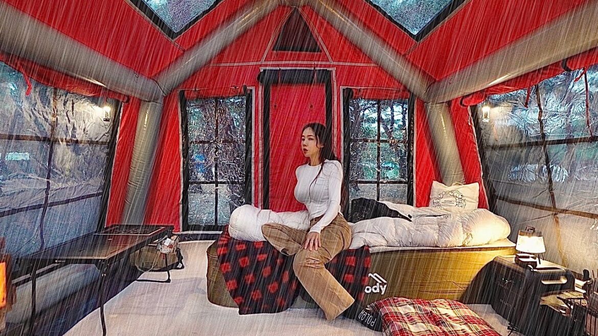 Camping in the rain in an inflatable tent in front of the beach . Rain sound ASMR