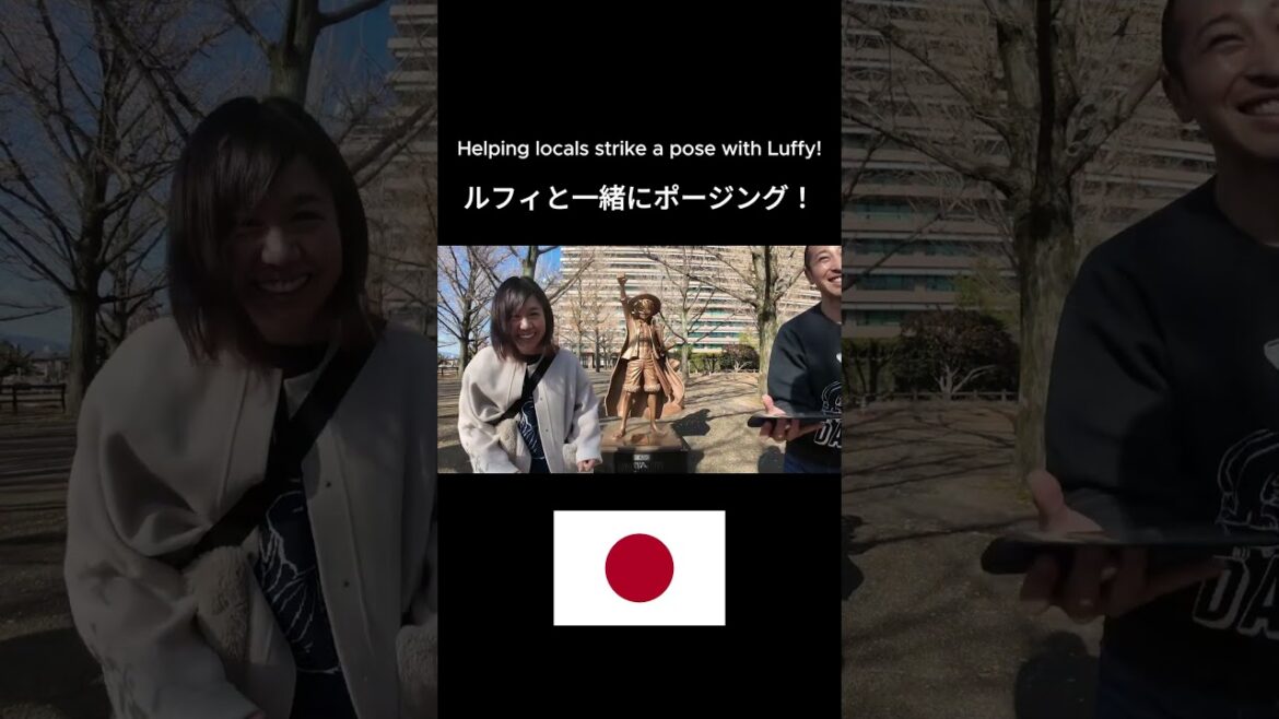 Energetic Locals Strike a Pose at Luffy’s Statue in Kumamoto! 📸✨