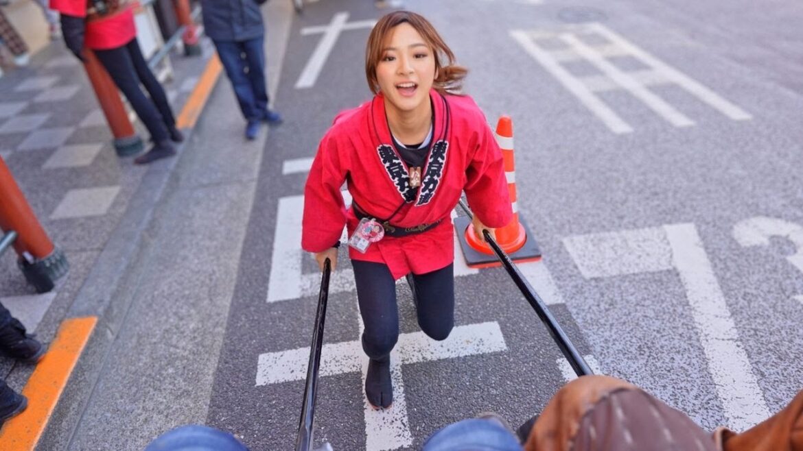 Japanese Girl Carries Two Big Dudes!