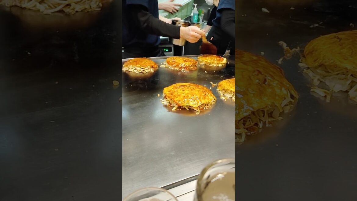 Hiroshima’s Most Famous Okonomiyaki! 🔥🍽️ #shorts #food #travel #okonomiyaki #foodie