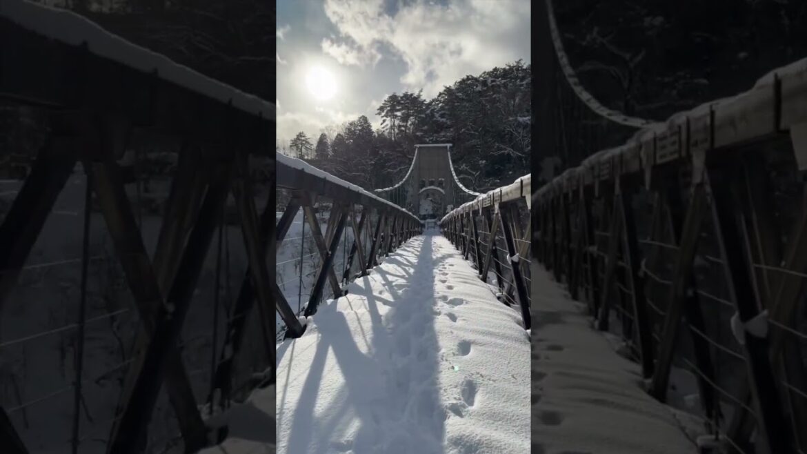 Snow covered Momosuke Bridge Nagiso valley