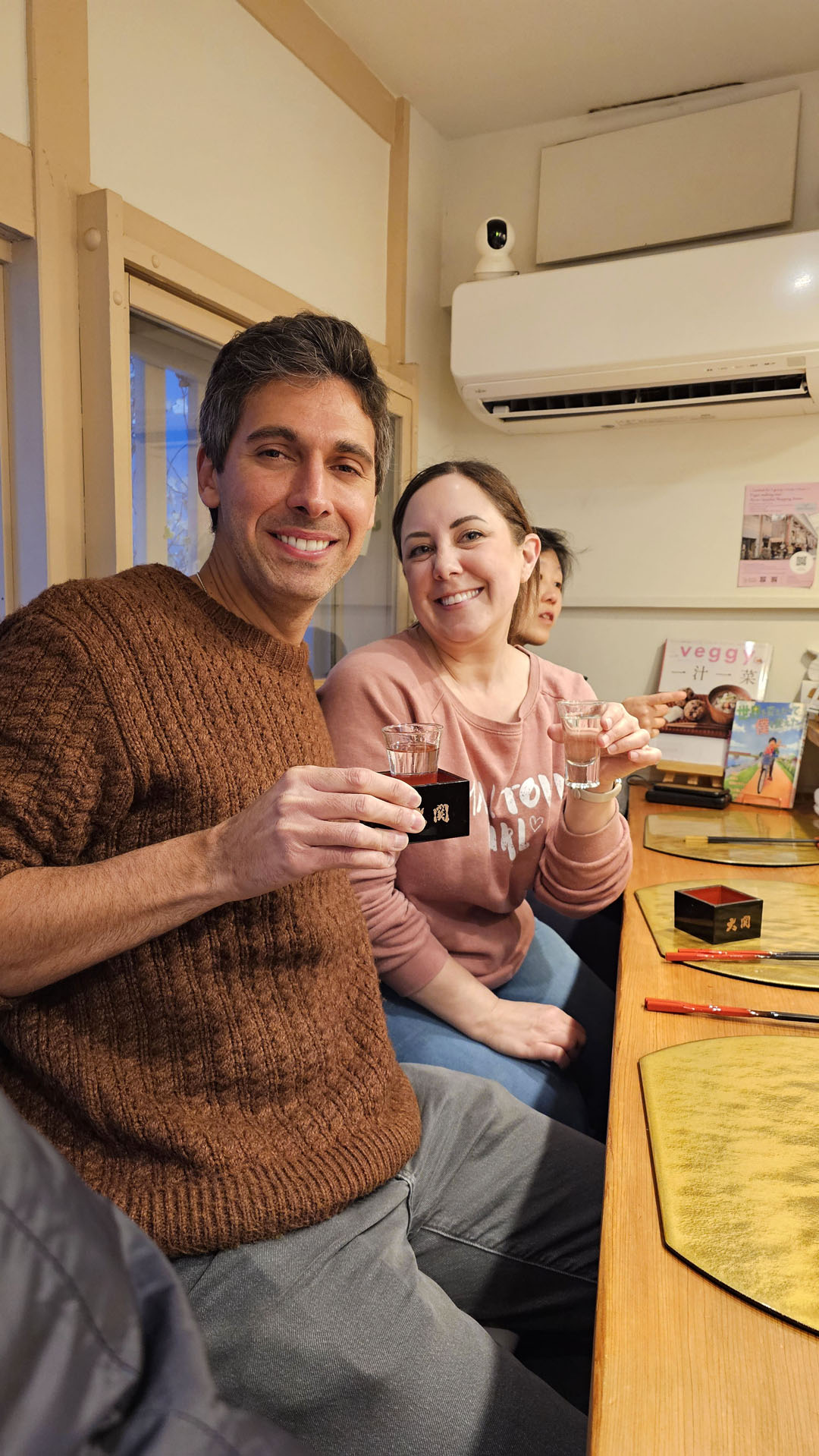 Justin and Lauren drinking sake