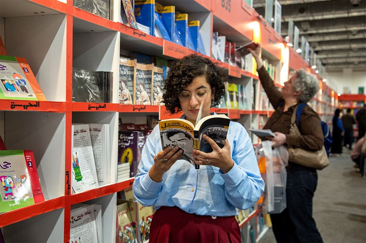 Seif holding her translation of Old Boy. (© Menna El-Azzamy)