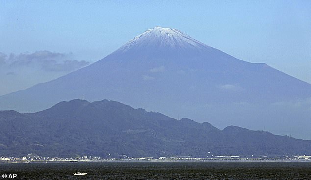 NOVEMBER 6: Usually, the 12,300ft mountain has sprinkles of snow falling on its summit from October 2, about a month after the summer hiking season there ends