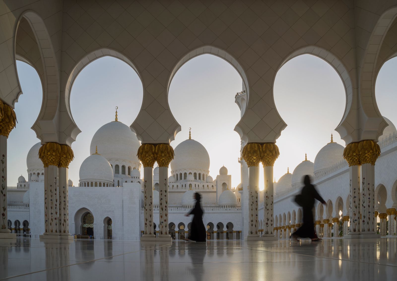 Image may contain Architecture Building Dome Person Mosque Arch Accessories Bag and Handbag