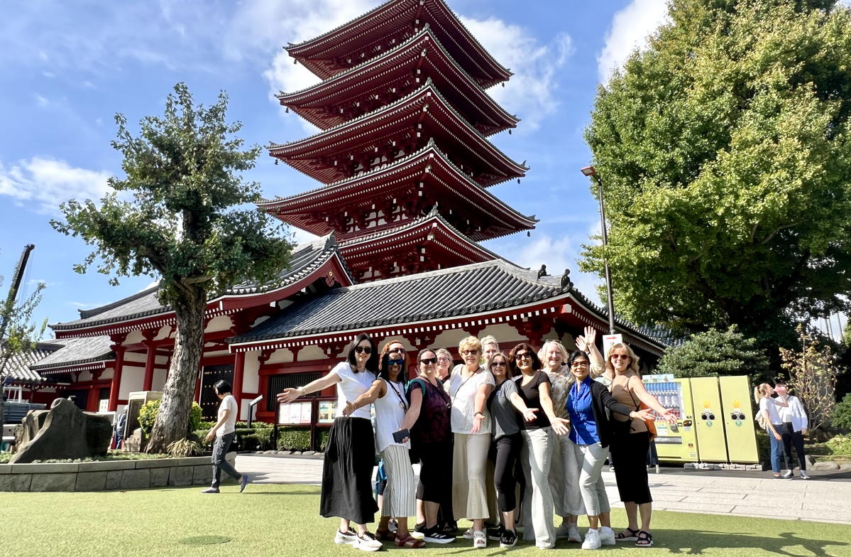 Posing with a pagoda at Senso-ji. (Pax Global Media)