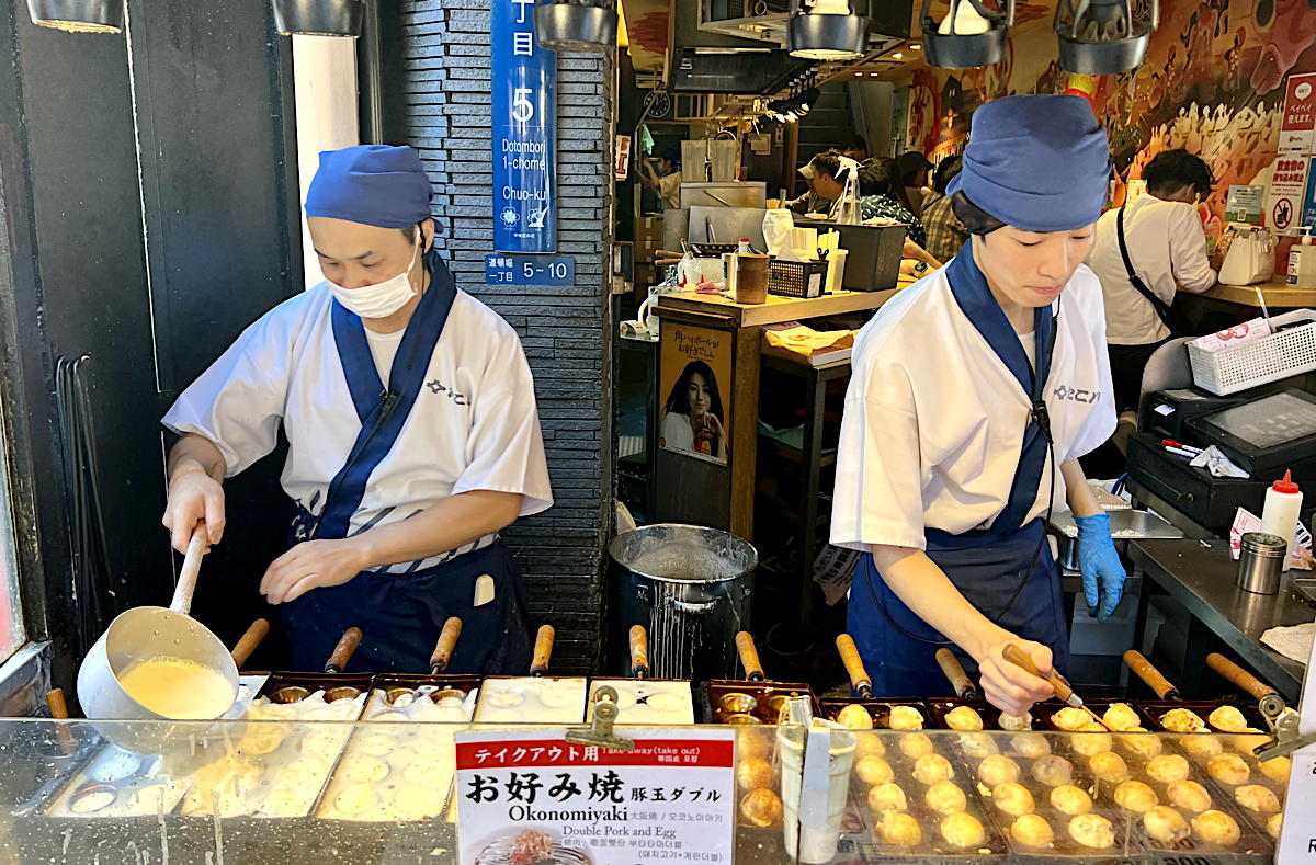 A fresh batch of takoyaki prepared on Dotonbori Street in Osaka. (Pax Global Media)