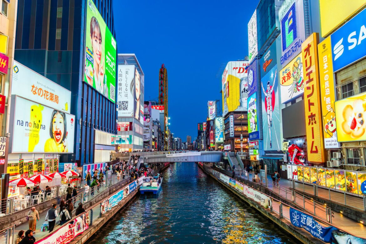 Move Over Tokyo! Condé Nast Reveals Japan’s 2025 Travel Hotspot Canal and neon signage in Osaka