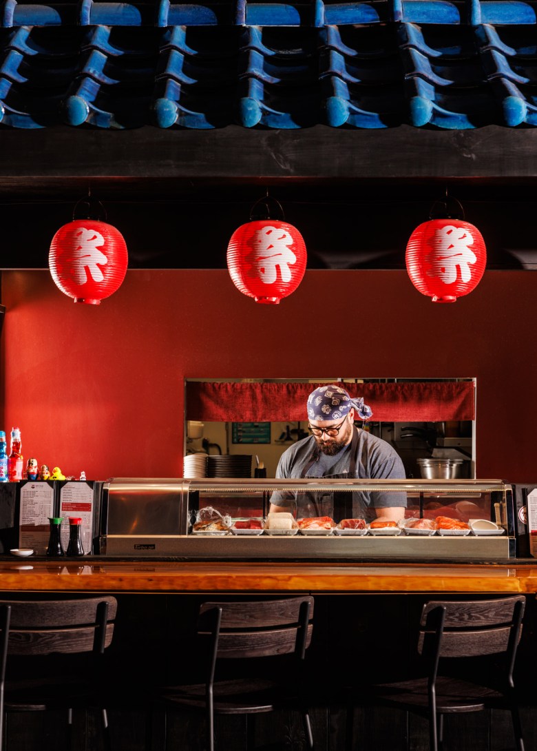 Aaron Jackson prepares sushi at Mt. Fuji