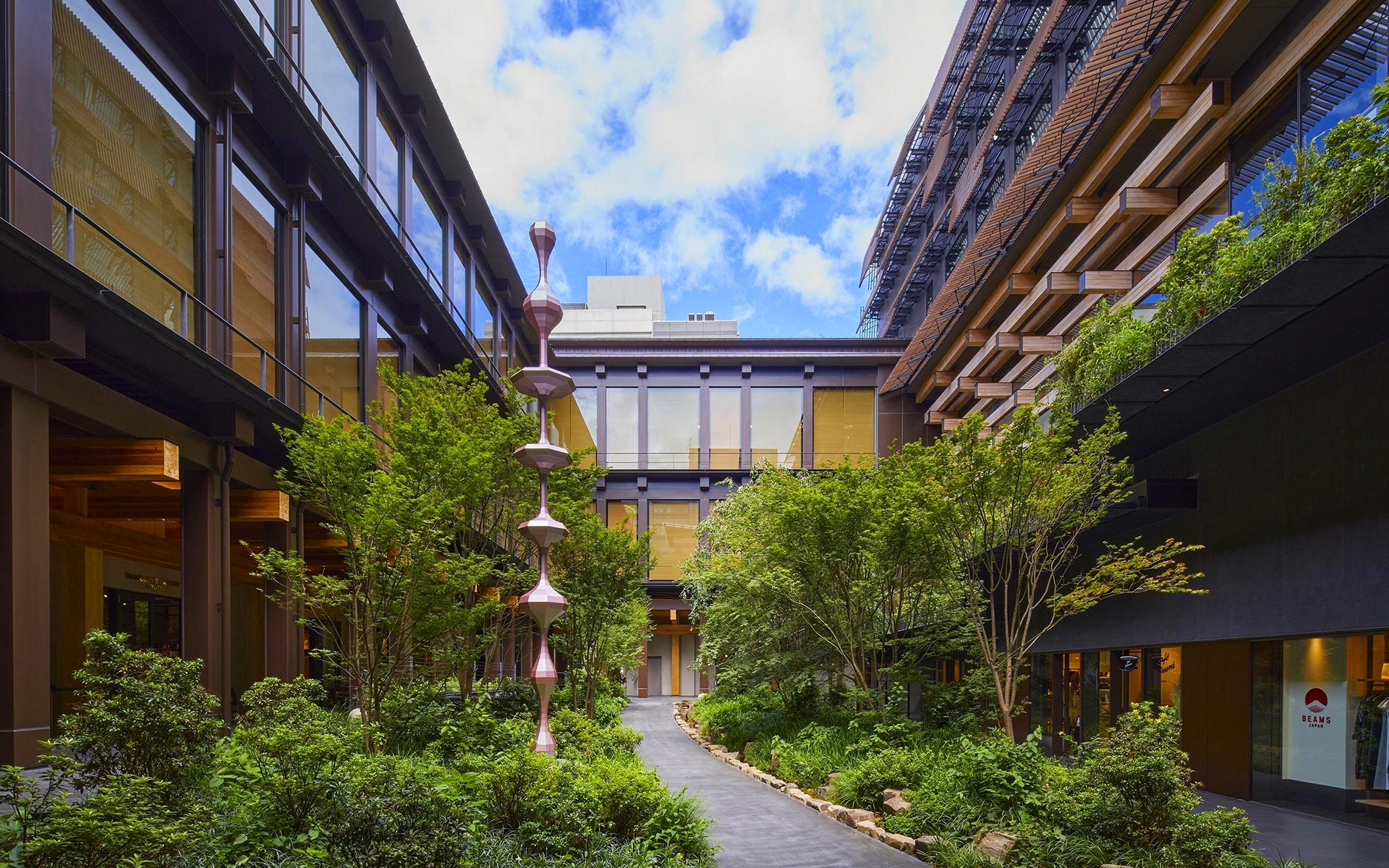 Ace Hotel Kyoto's outdoor space connects to nearby shops.