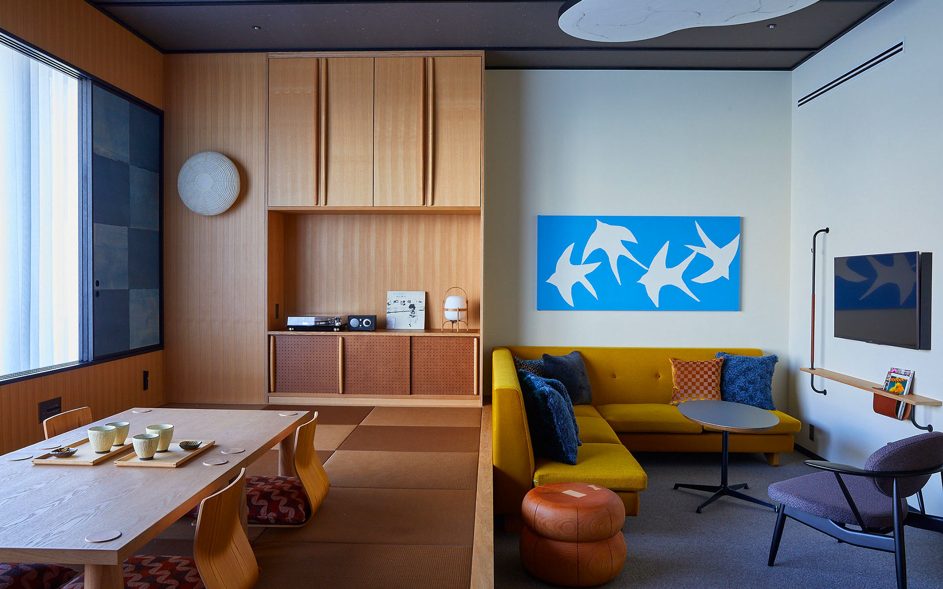 The Tatami Suite, including four futons, a private bar, and a double vanity.