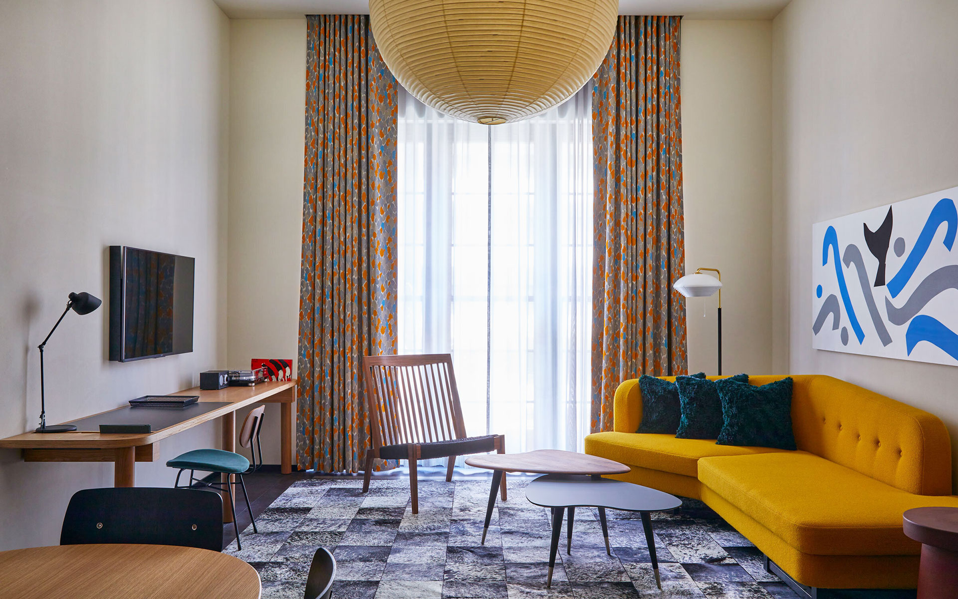 The Loft Suite, including two double beds and a separate area with its own bar, dining and living space.