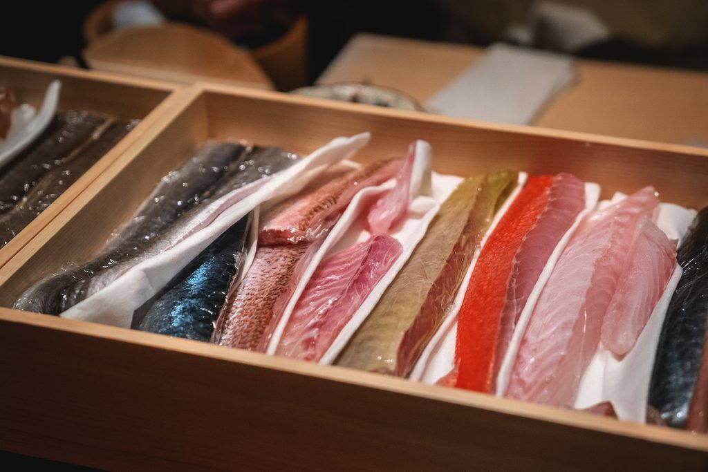Showing off the day's catch at Mizuki Sushi