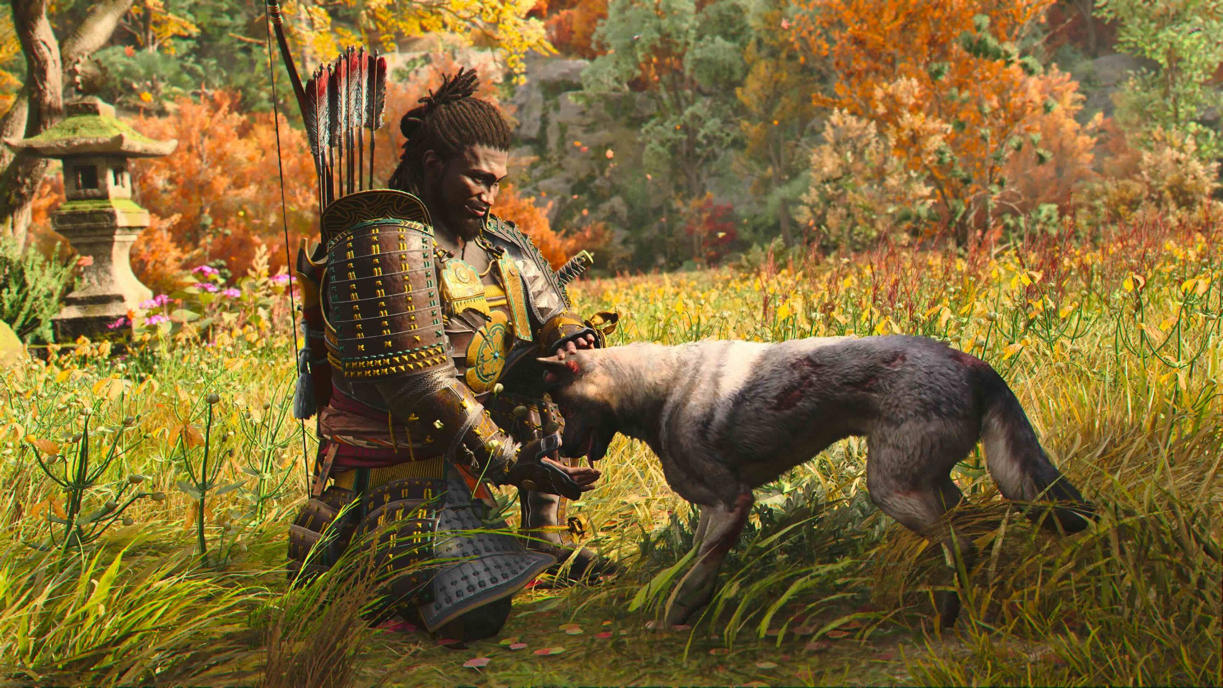 Yasuke pets a dog during fall in Assassin’s Creed Shadows