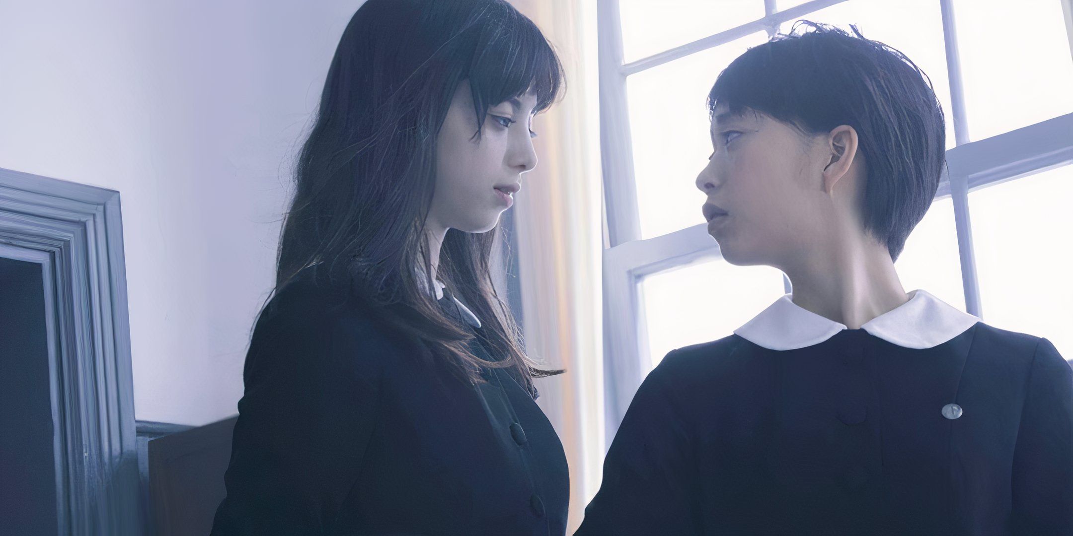 Ayami Nakajô and Aoi Morikawa stare at one another intensely. 
