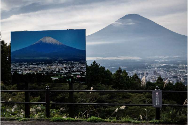 Japan's Mount Fuji, snowless for the longest since records began 130 years ago, is expected to finally get its famous white cap back next week