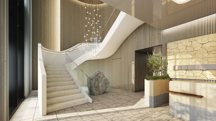 a smooth curved spiral staircase / photo = Marriott