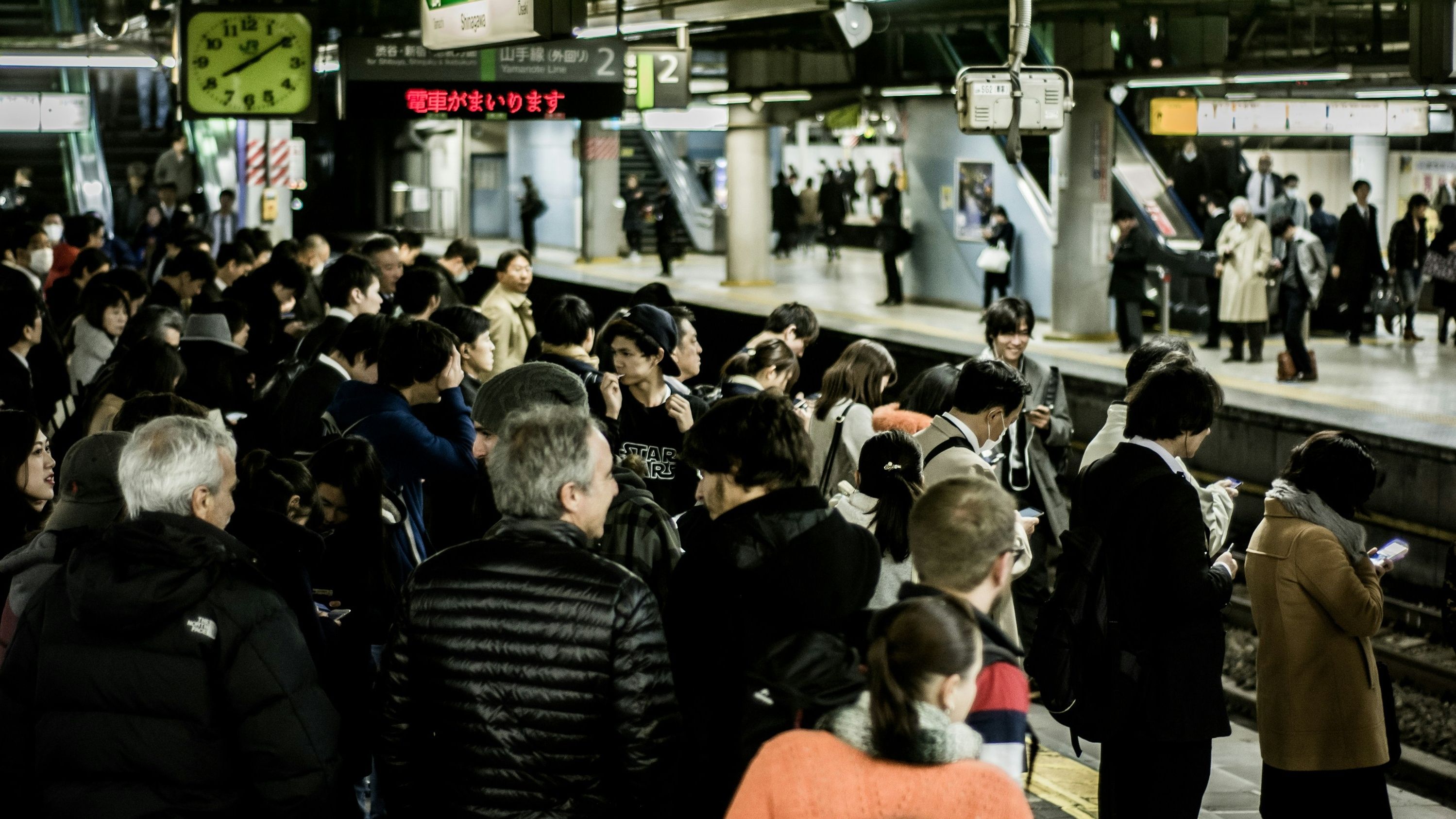 Passengers inside Shinjuku Station in Tokyo, Japan