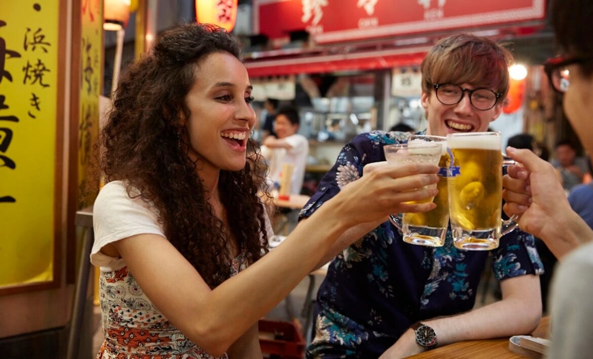 Tourists in Japan drinking beer, which doesn't exist in other countries
