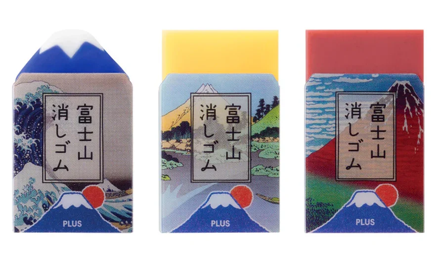 a series of three erasers in blue, yellow, and red inspired by Hokusai's renderings of Mt. Fuji