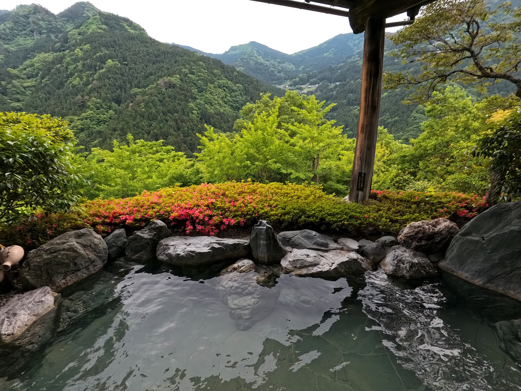 mountain view from an onsen hot bath in japan.