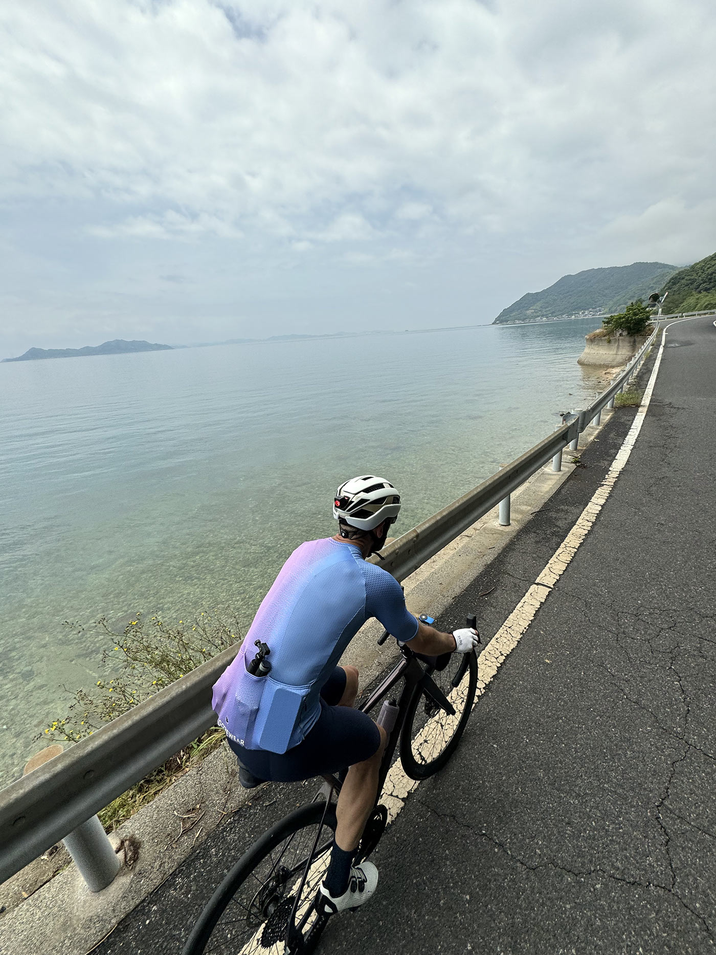 steve riding along the coast of shikoku island.