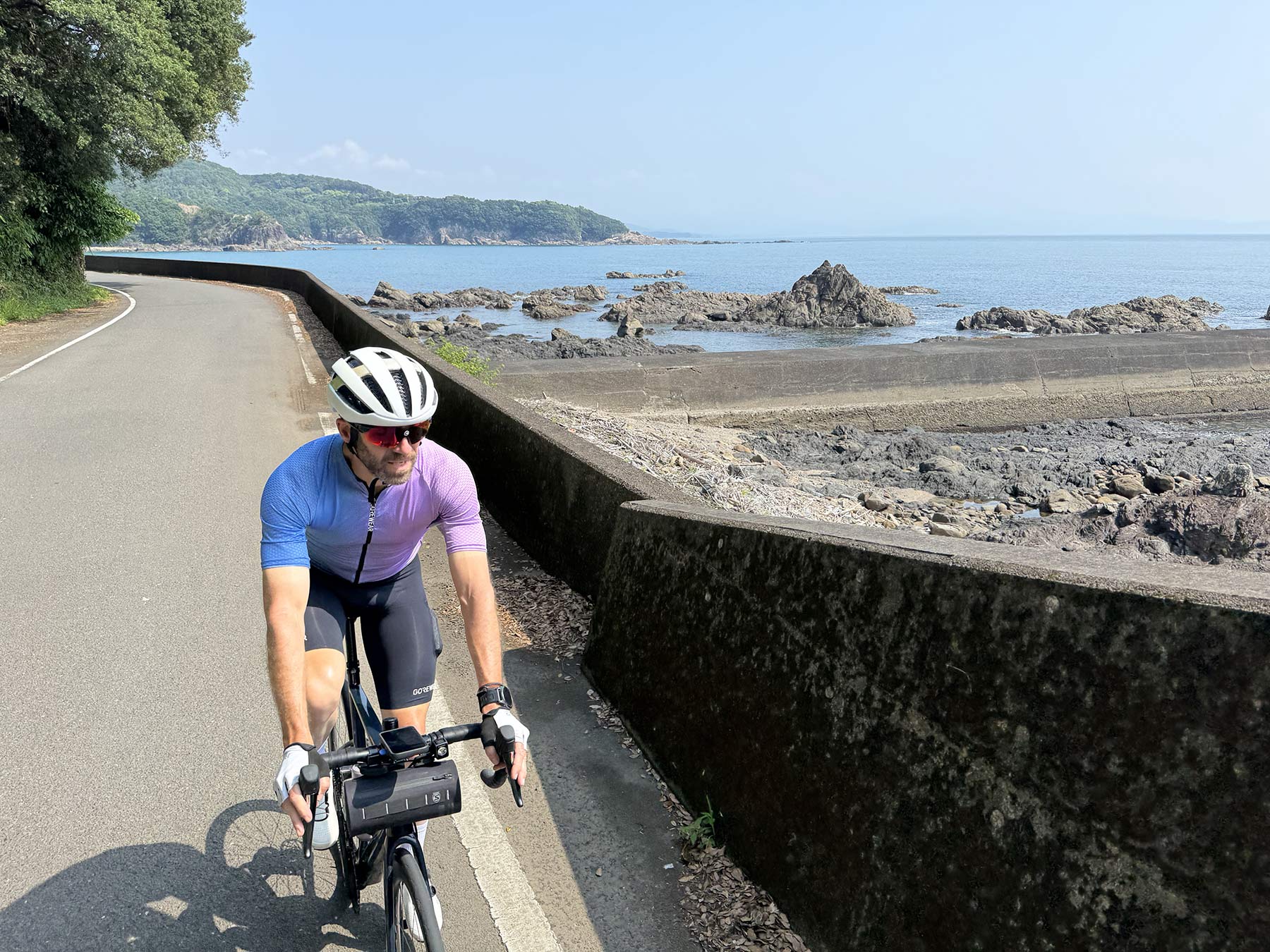 steve riding along the coast of shikoku island.
