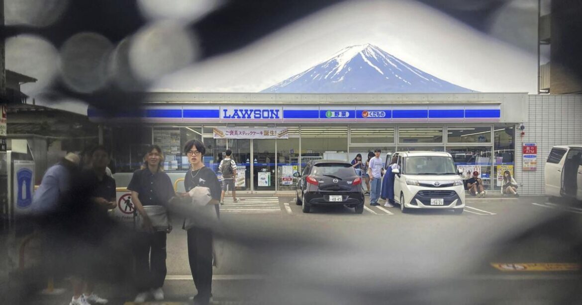 Screen meant to block tourist snaps of Mt. Fuji has holes in it Screen meant to block tourist snaps of Mt. Fuji has holes in it