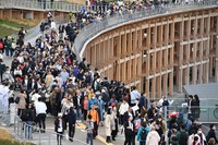 The Grand Ring, the symbol of the Expo 2025 Osaka, Kansai, is seen crowded with people in Osaka's Konohana Ward on April 13, 2025, the opening day of the event. (Mainichi/Tadashi Kako)