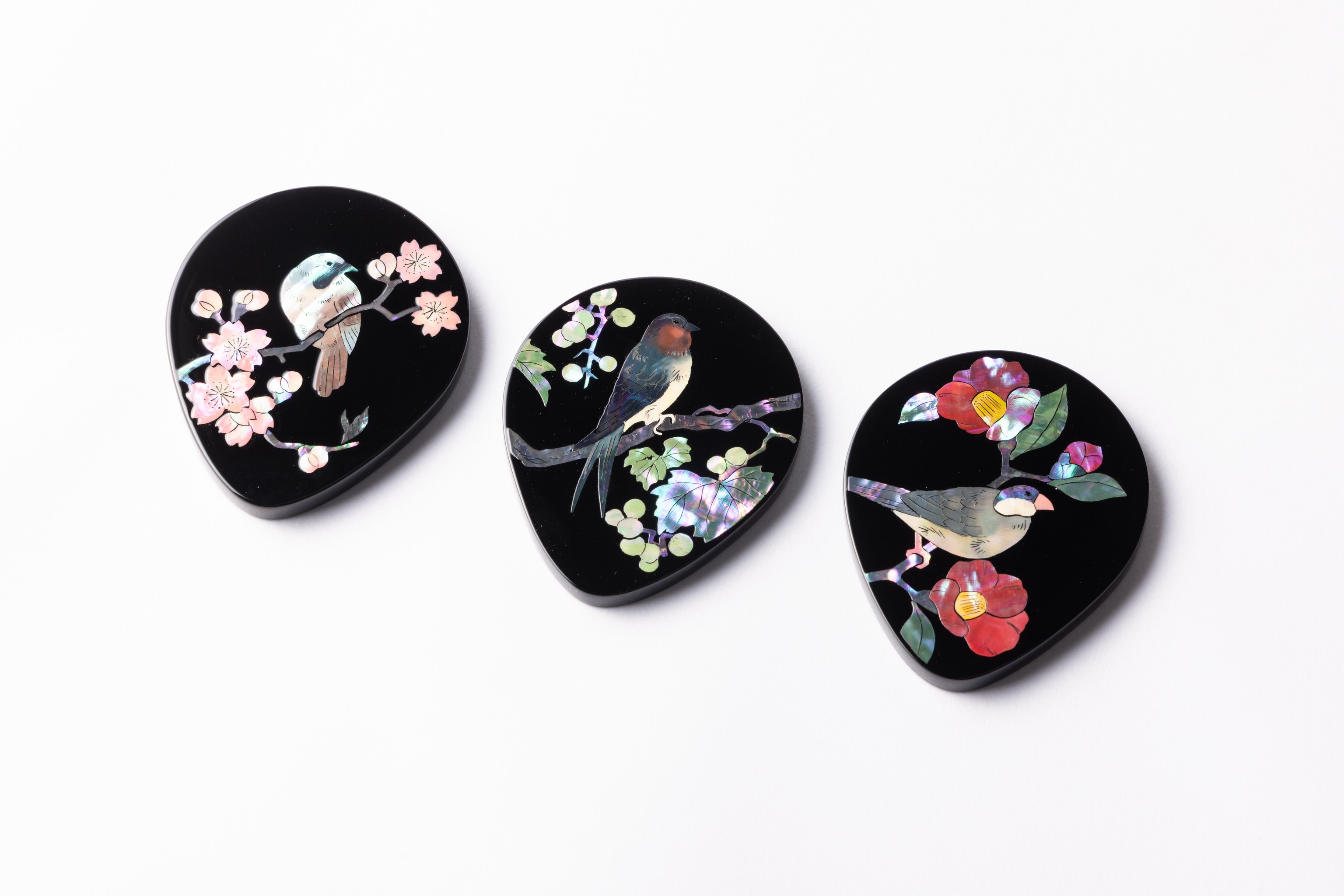 Takaoka shikki, lacquerware made in Toyama, adorned with intricate raden (mother of pearl) inlay by master craftsman Takeshi Musashigawa.
