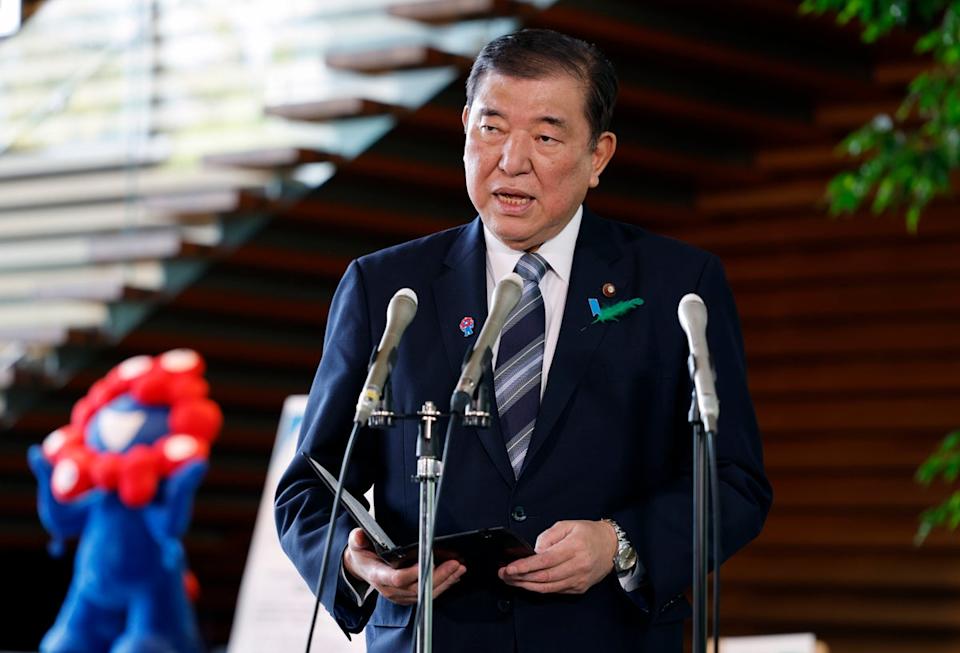 Japanese Prime Minister Shigeru Ishiba reacts to talks regarding US tariffs (EPA)